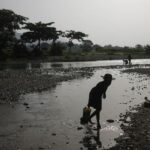 Cleanup Begins of Haitian Town’s Earthquake-Crumbled Homes