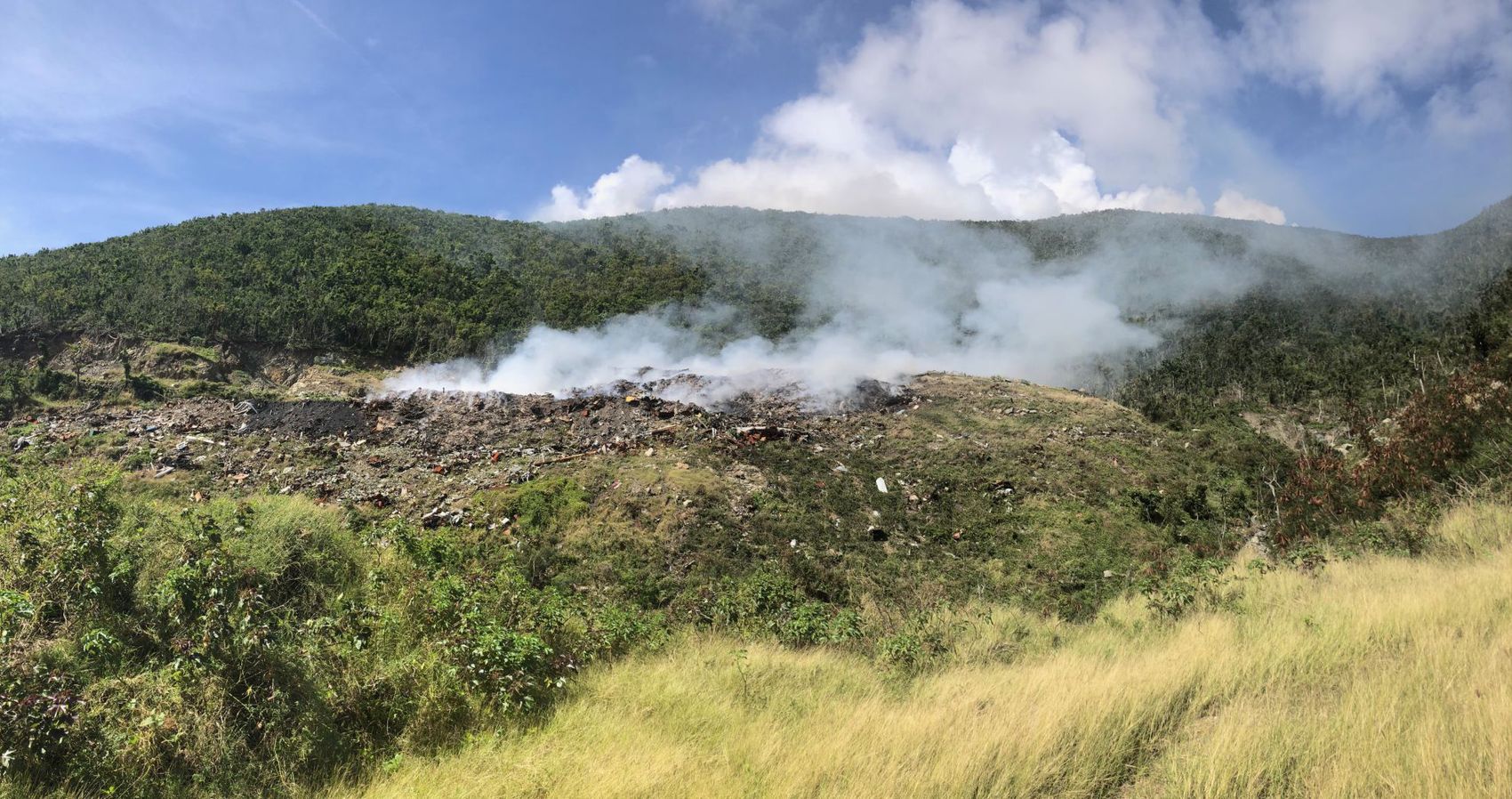 DEBRIS PROBLEM SPARKS CONTROVERSY: BVI Officials Say Dump Fire Started Spontaneously and Tried To Put It Out Tuesday ... But It Was Still Smoldering Wednesday