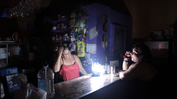 Puerto Rico Is Still A Candle-Lit Flickering Mess After Hurricane Maria Hit Six Months Ago