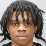 Coward Extradited From Baltimore To Face Charges In Barber Shop Armed Robbery