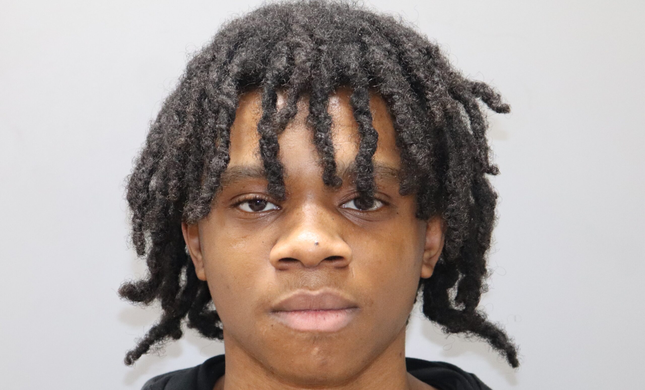 Coward Extradited From Baltimore To Face Charges In Barber Shop Armed Robbery