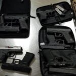 CBP FINDS: 2 Air Passengers With 10 Handguns, 4 Rifles, 1 Shotgun, 2 Bullet-Proof Vests, 407 Rounds Of Ammunition