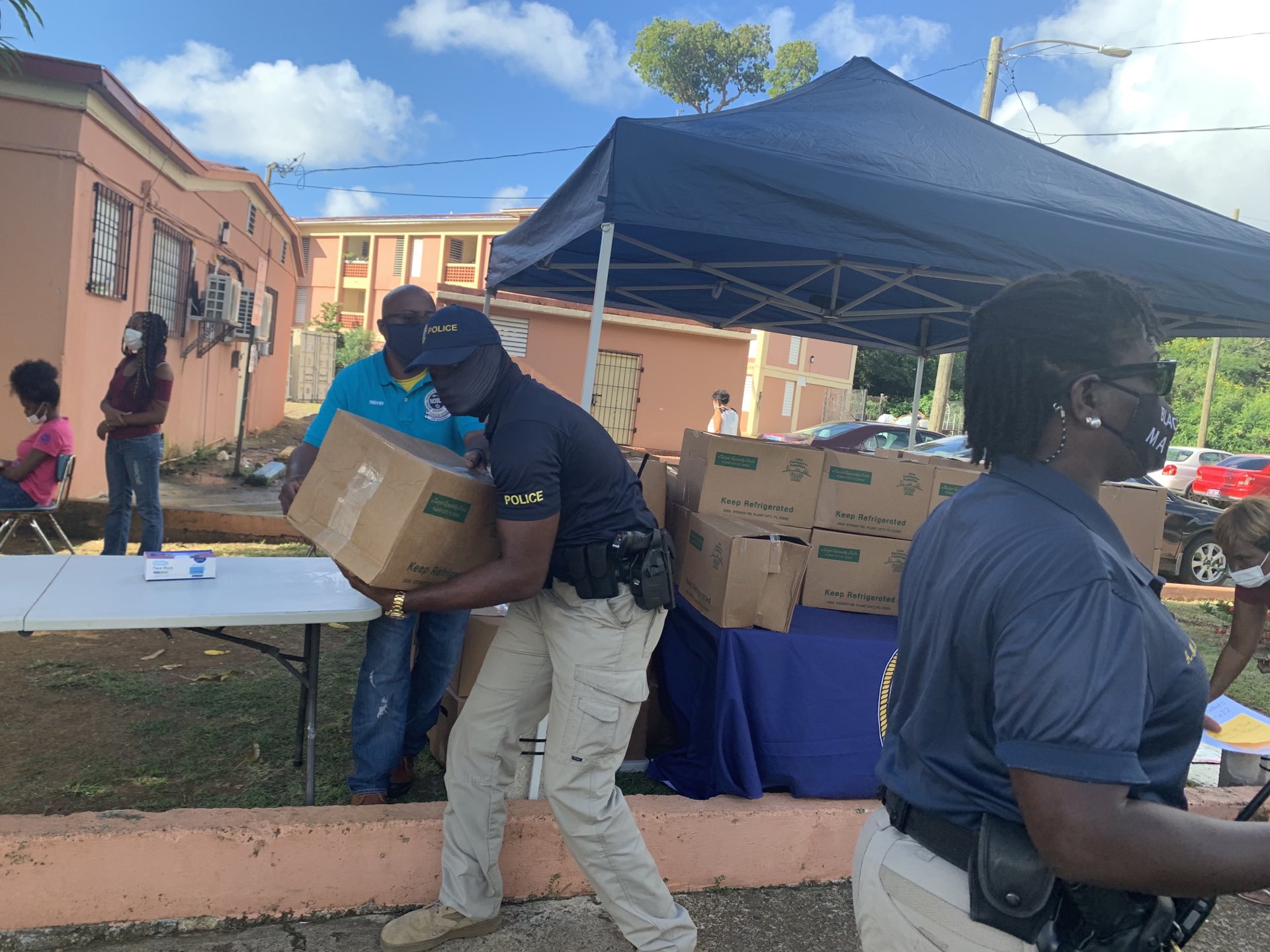 Kirwan Terrace Residents Get Free Boxes Of Food From The Virgin Islands Police Department