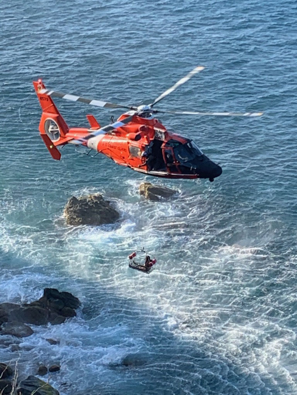 U.S. Coast Guard Aircrew Rescues 5 Stranded Kayakers At Caret Point In St. Thomas