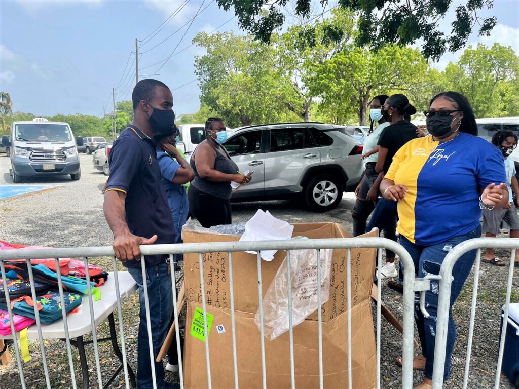 St. Croix Senator Helps Give Out Free Book Bags At N.E.S.T. Event At Chicken Shack