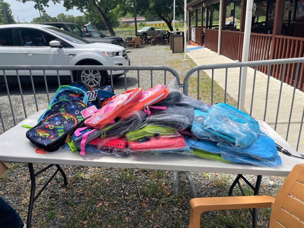 St. Croix Senator Helps Give Out Free Book Bags At N.E.S.T. Event At Chicken Shack
