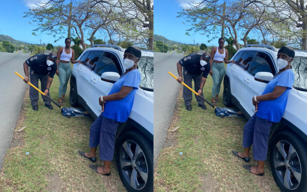 ‘To Protect and Serve’ Virgin Islands Police Officer Assists Motorist With Flat Tire