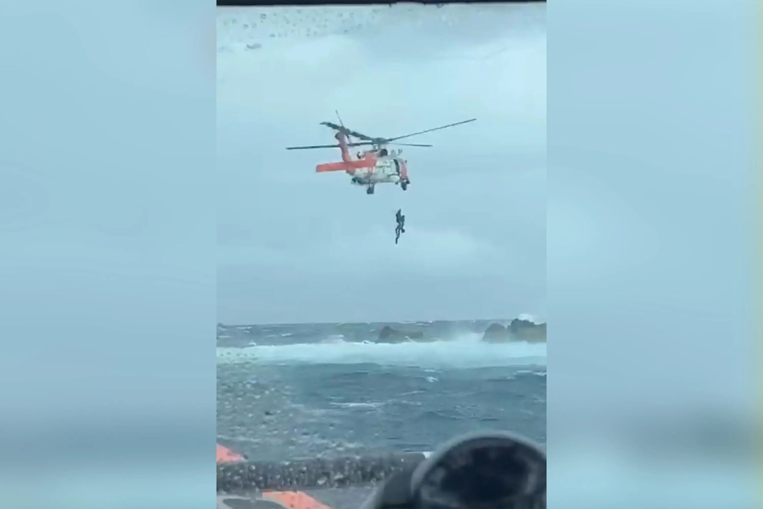 Stranded Fisherman Clinging To Rock Saved By Coast Guard During Tropical Storm Earl Off Dog Island