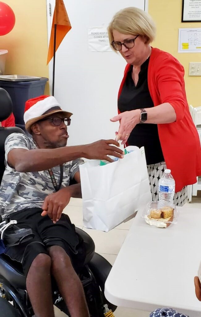 Ocwen USVI Brings Gift Bags To 58 Seniors At Flambouyant Gardens In Time For Christmas