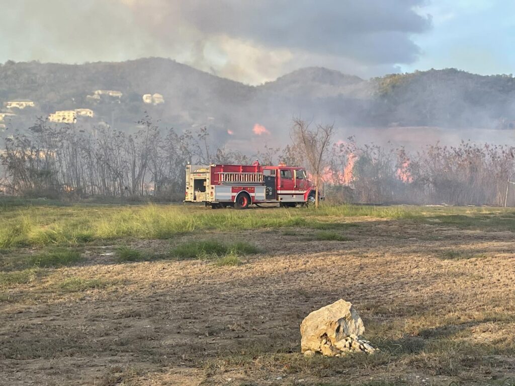 Firefighters Extinguish Blaze On Agricultural Land During Drought In St. Croix