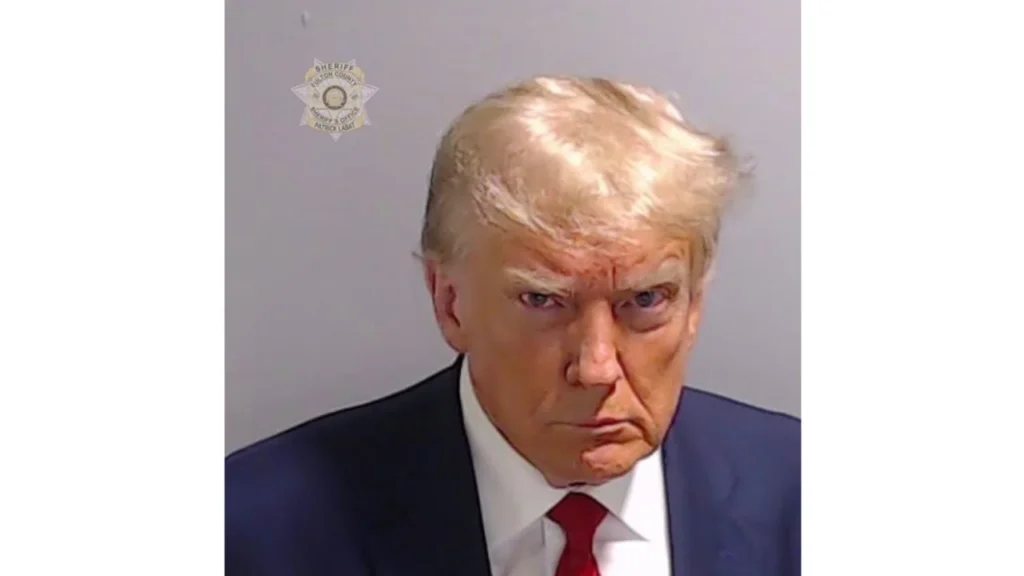 Trump's mug shot released after booking at Georgia jail on election charges