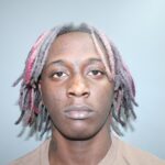 Man arrested after police chase leads to recovery of gun, ammunition