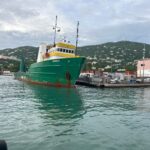 Coast Guard floats stranded boat away from position at sea