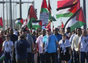 Thousands led by Cuba’s president march in Havana in solidarity with Palestinian people