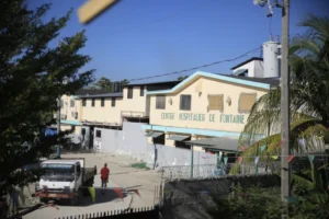Heavily armed Haitian gang surrounds hospital in capital and traps people inside