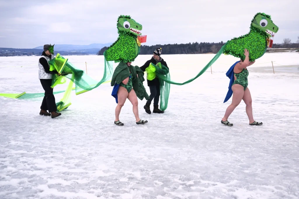 ‘Totally cold’ is not too cold for winter swimmers competing in a frozen Vermont lake