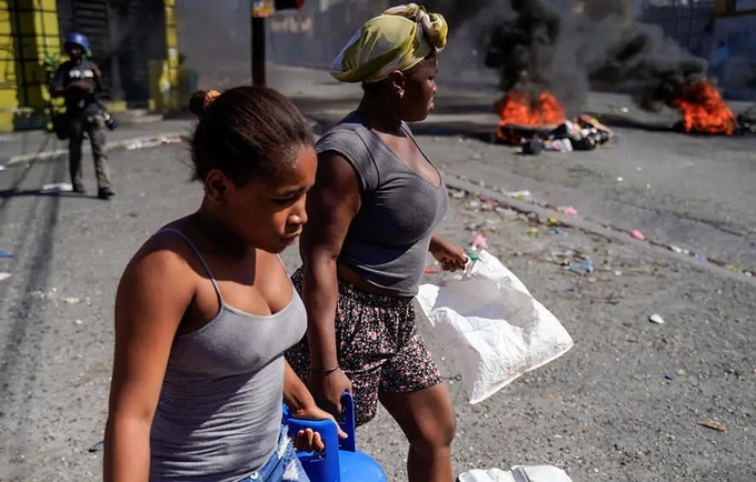 Haiti’s prime minister calls for calm as violent protests seek his ouster