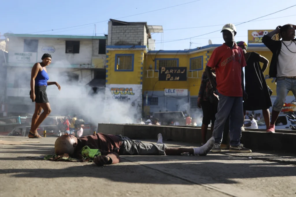 Gangs unleash new attacks on upscale areas in Haiti’s capital, with at least a dozen killed nearby