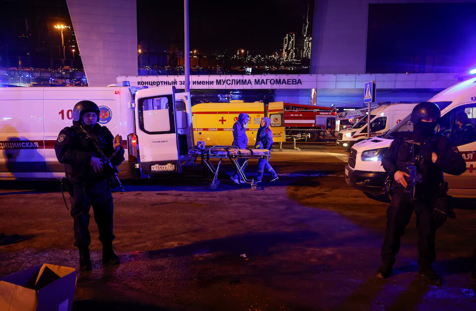 Gunmen kill 40 in attack at concert hall near Moscow, state news agency says