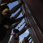 Haitians scramble to survive, seeking food, water and safety as gang violence chokes the capital