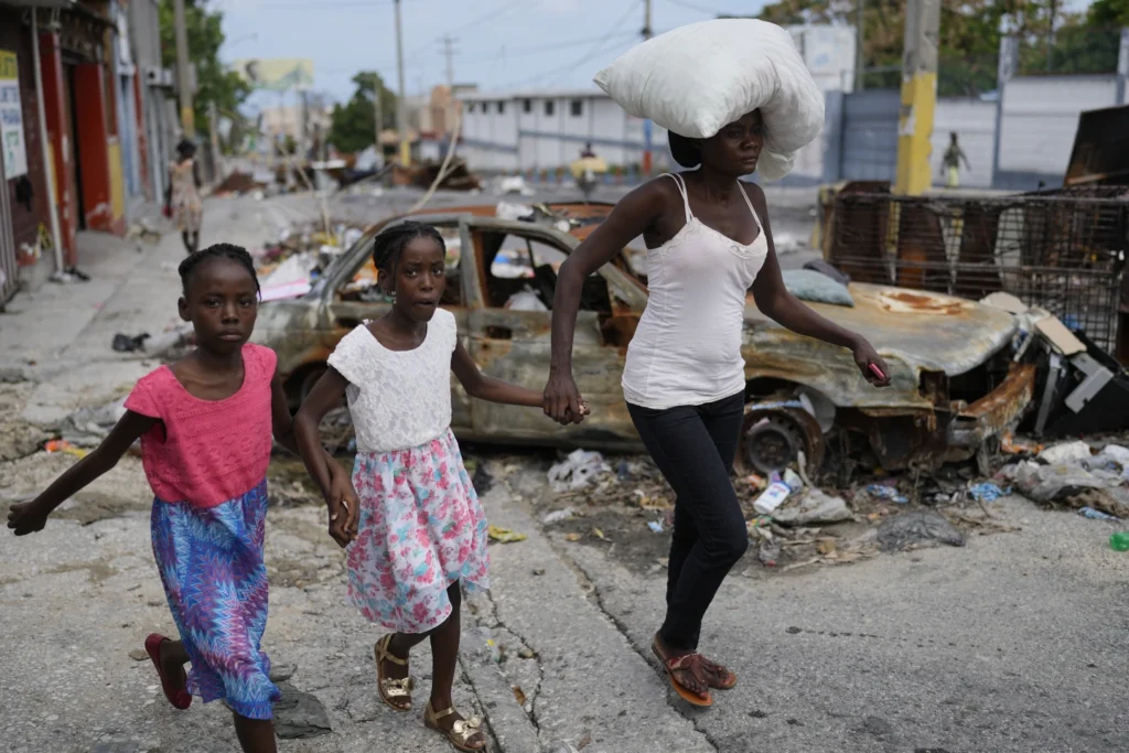 Gangs in Haiti launch fresh attacks, days after a new prime minister is announced