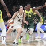 Jewell Loyd scores 32 before sellout of 18,000, Seattle holds off Caitlin Clark and Fever 85-83