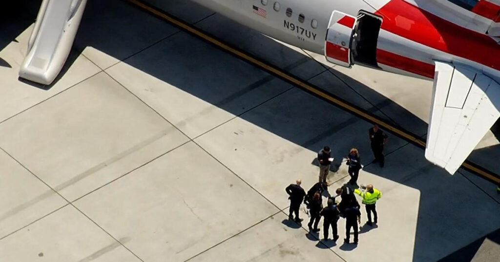 Passengers on flight from California to South Florida land after evacuating plane when smoke from laptop fills cabin