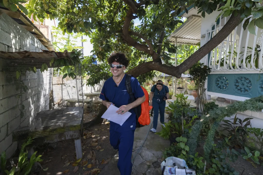 As doctors leave Puerto Rico in droves, a rapper tries to fill in the gaps