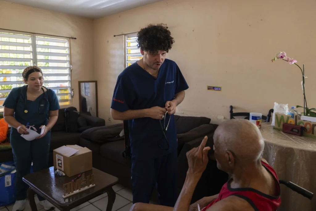 As doctors leave Puerto Rico in droves, a rapper tries to fill in the gaps