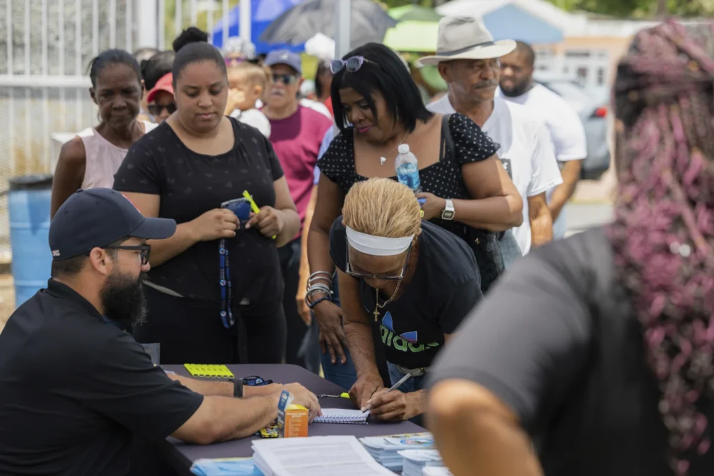 As doctors leave Puerto Rico in droves, a rapper tries to fill in the gaps