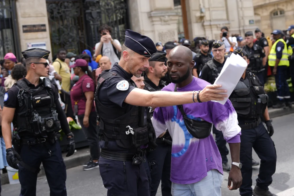 Migrants and homeless people are cleared out of Paris during the Olympics