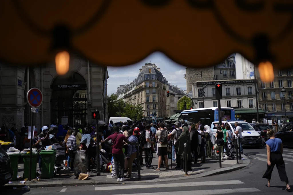 Migrants and homeless people are cleared out of Paris during the Olympics