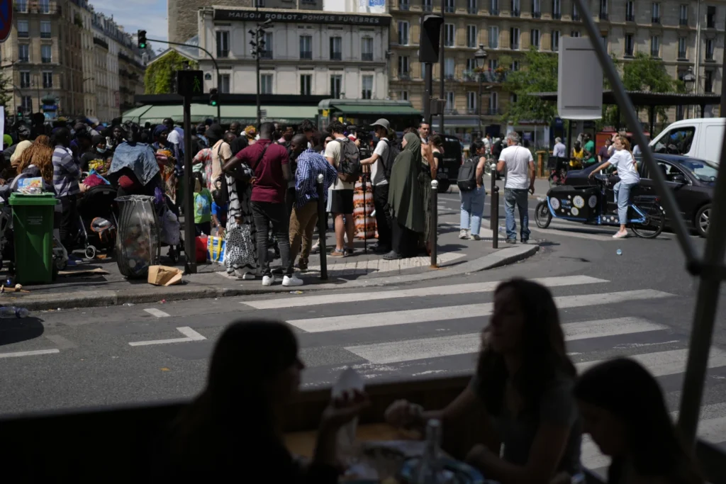 Migrants and homeless people are cleared out of Paris during the Olympics