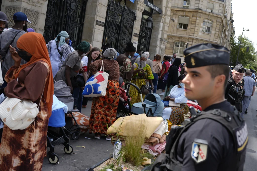 Migrants and homeless people are cleared out of Paris during the Olympics