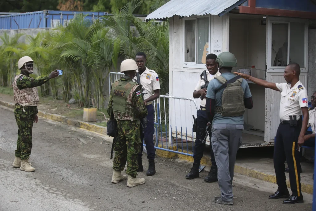 Haiti’s prime minister says Kenyan police are crucial to controlling gangs, early days are positive