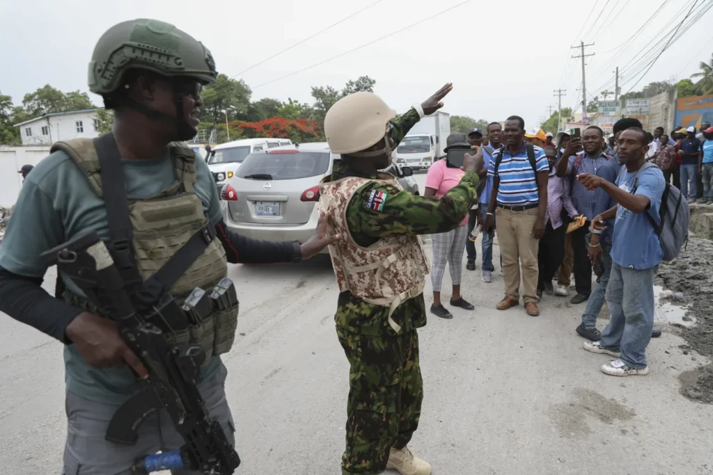 Haiti’s prime minister says Kenyan police are crucial to controlling gangs, early days are positive