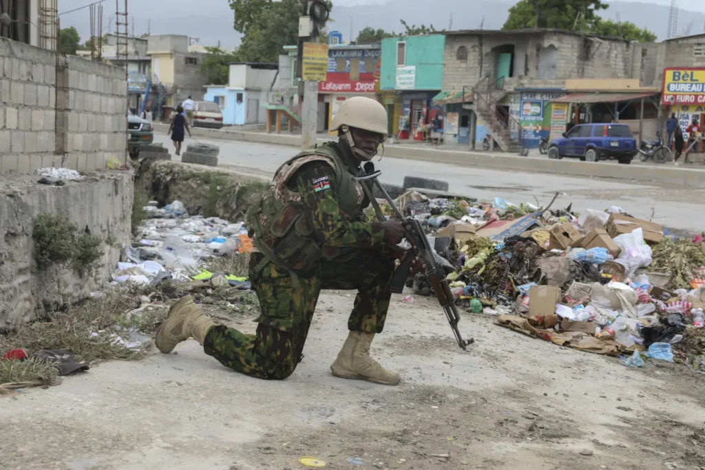 Haiti’s prime minister says Kenyan police are crucial to controlling gangs, early days are positive