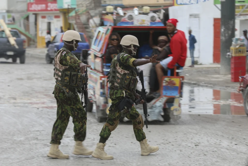 Haiti’s prime minister says Kenyan police are crucial to controlling gangs, early days are positive