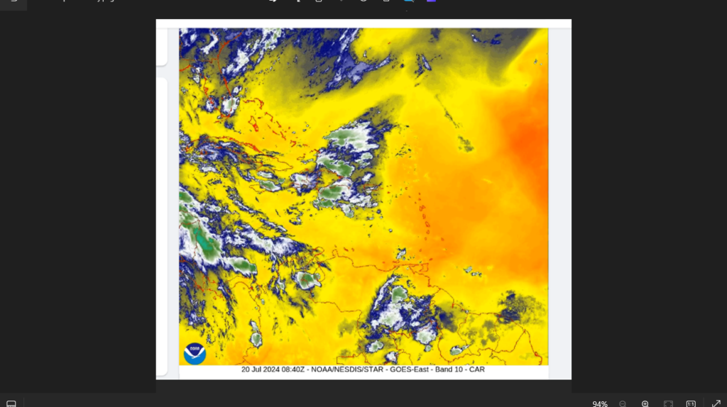 Tropical wave leaving, Saharan dust plume moving in, high rip current risk for St. Croix