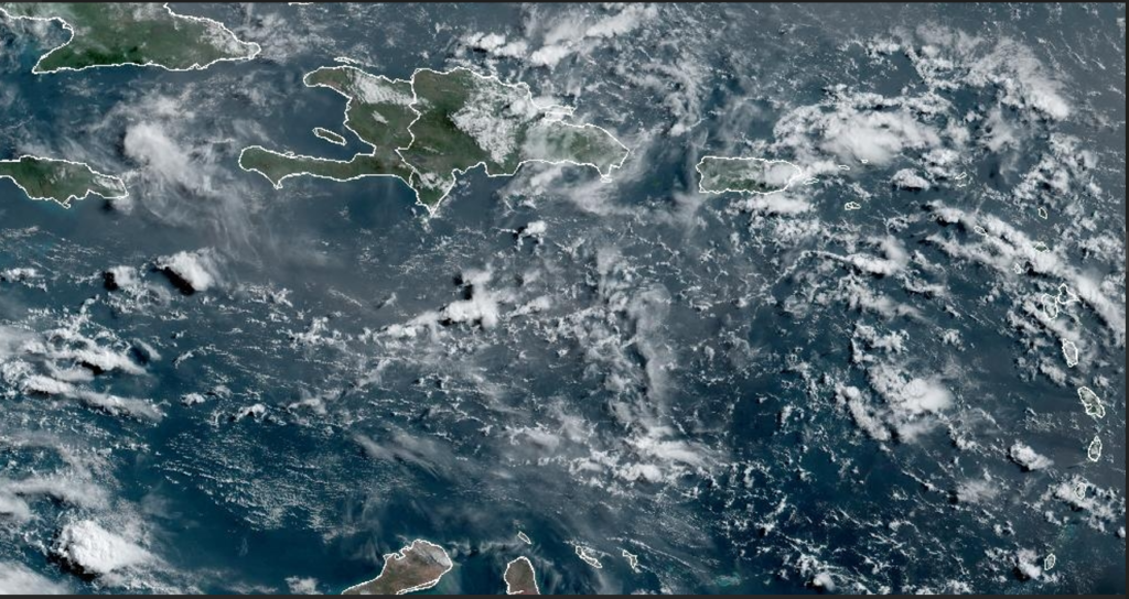 Passing of tropical wave, upper level trough will leave humid, wet conditions