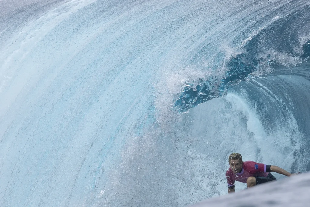 Judge removed from Olympics surfing panel after photo with athlete circulates on social media