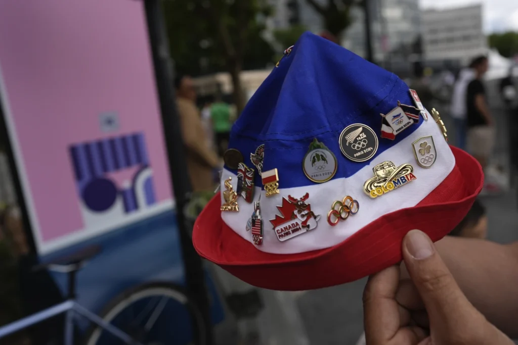 Pin-demonium hits Paris: Inside the pin-trading market at the Olympics