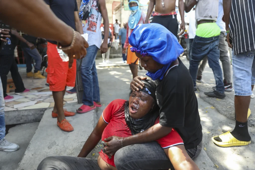 Haitian police tear-gas peaceful protesters as they demand help in stopping gangs