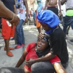 Haitian police tear-gas peaceful protesters as they demand help in stopping gangs
