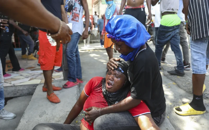 Haitian police tear-gas peaceful protesters as they demand help in stopping gangs