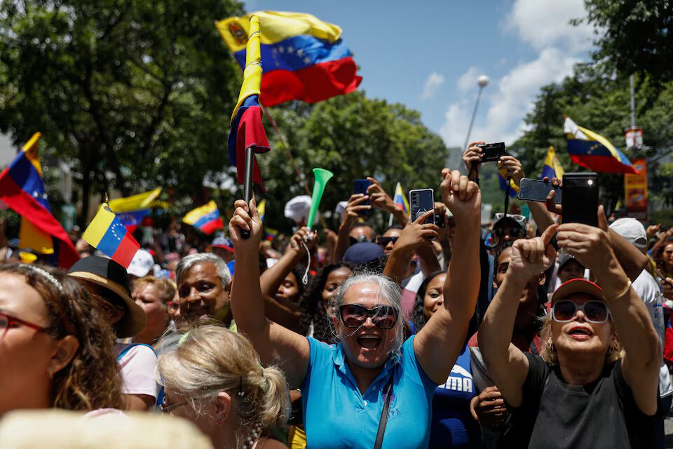 Venezuelans march over contested election, number of detained rises