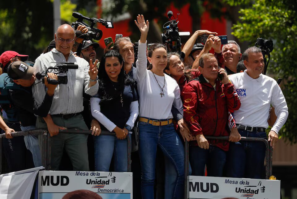 Venezuelans march over contested election, number of detained rises