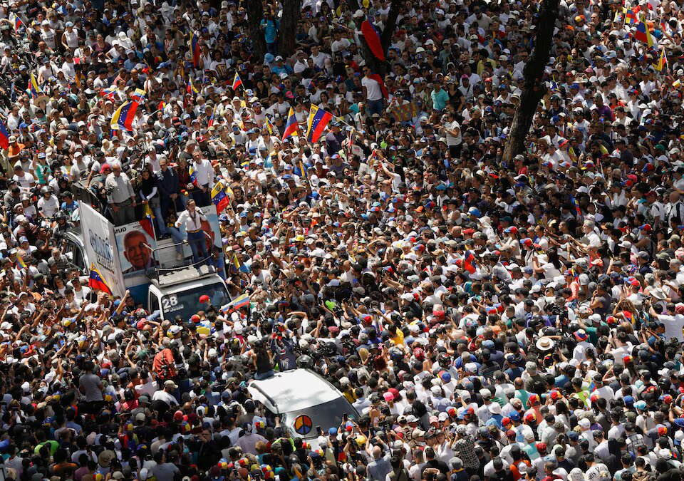 Venezuelans march over contested election, number of detained rises