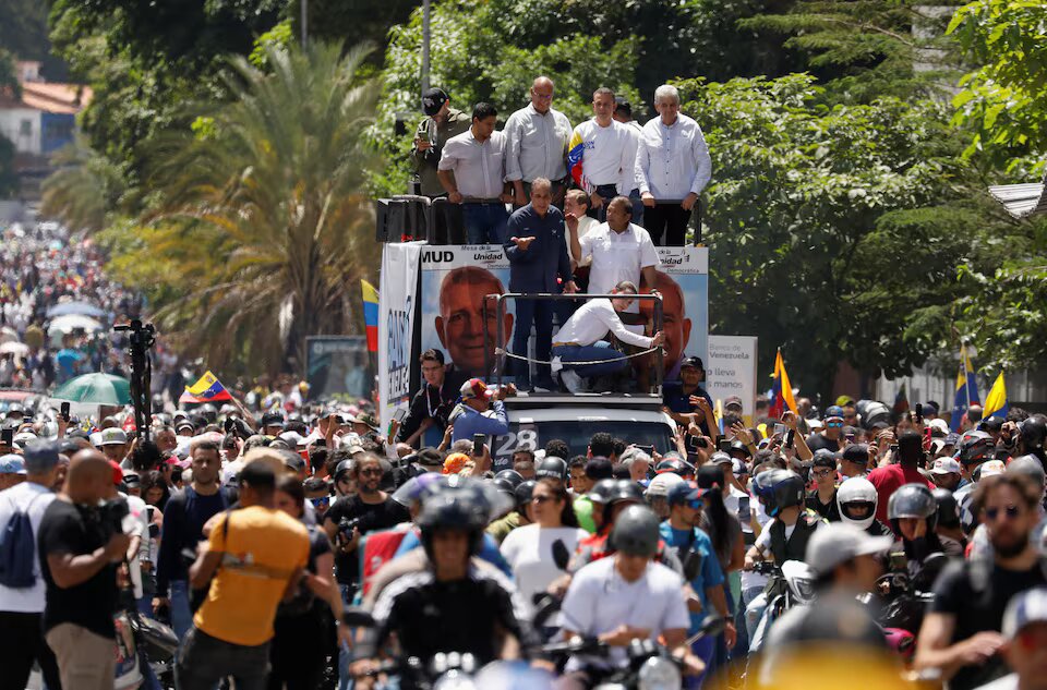 Venezuelans march over contested election, number of detained rises