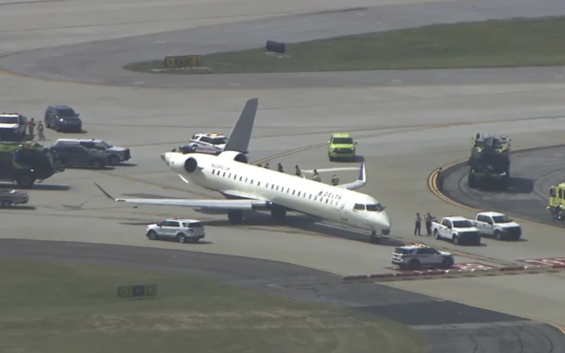 Two Delta planes collide on an Atlanta taxiway, knocking the tail off one